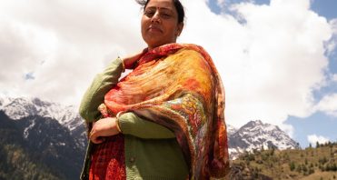 woman with mountains in background